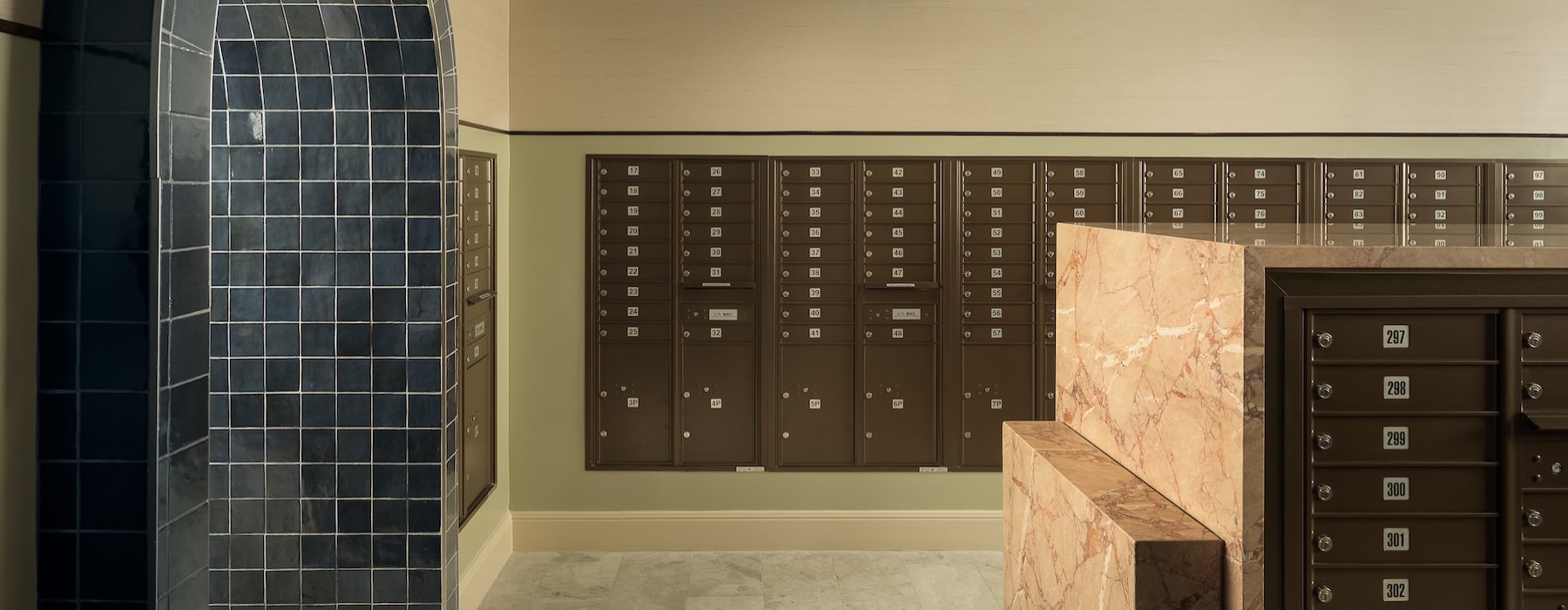 a mailroom with an arched doorway